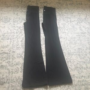 In excellent condition…2 pairs Athleta Elevation Flare Pants.   Both size small.